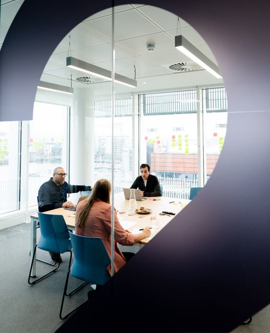 People gathered in a modern office space.